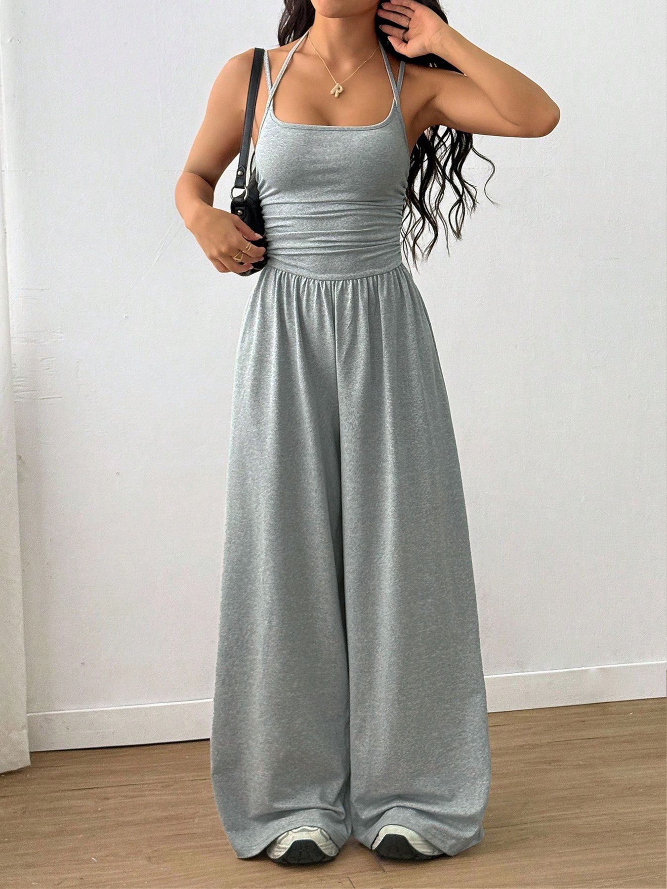 Summer new women's jumpsuit solid color sleeveless suspenders high waist wide leg pants casual jumpsuit suitable for daily leisure commuting parties.