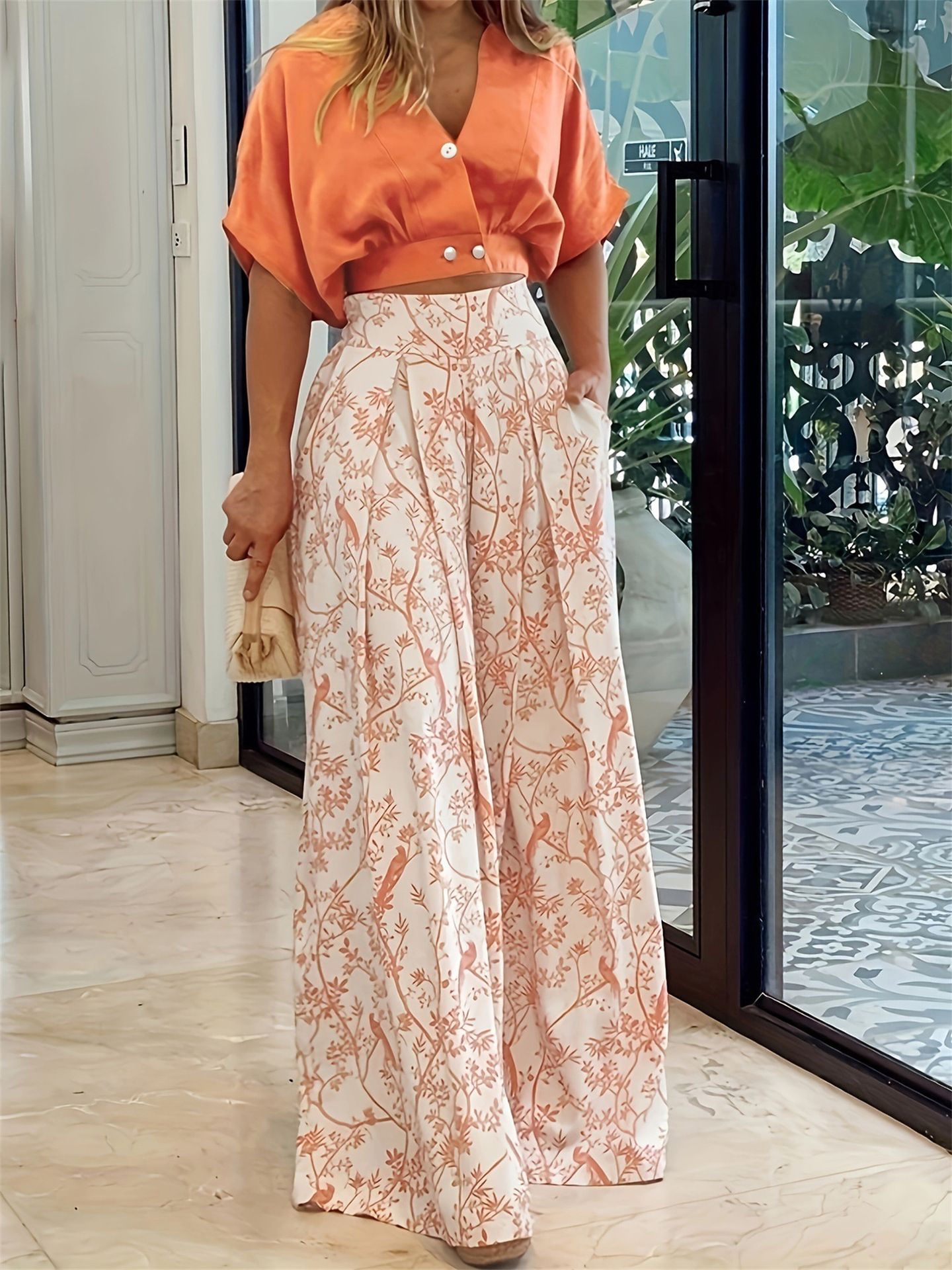 Summer new women's two-piece suit with solid color printing short-sleeved V-neck shirt jacket and casual wide-leg trousers suit is suitable for daily leisure commuting.