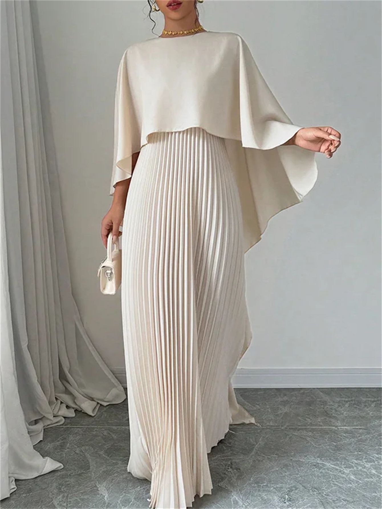 New women's dresses in summer are fashionable, solid colors, irregular pleated bat sleeves and loose long dresses, which are suitable for daily casual parties and dinners.