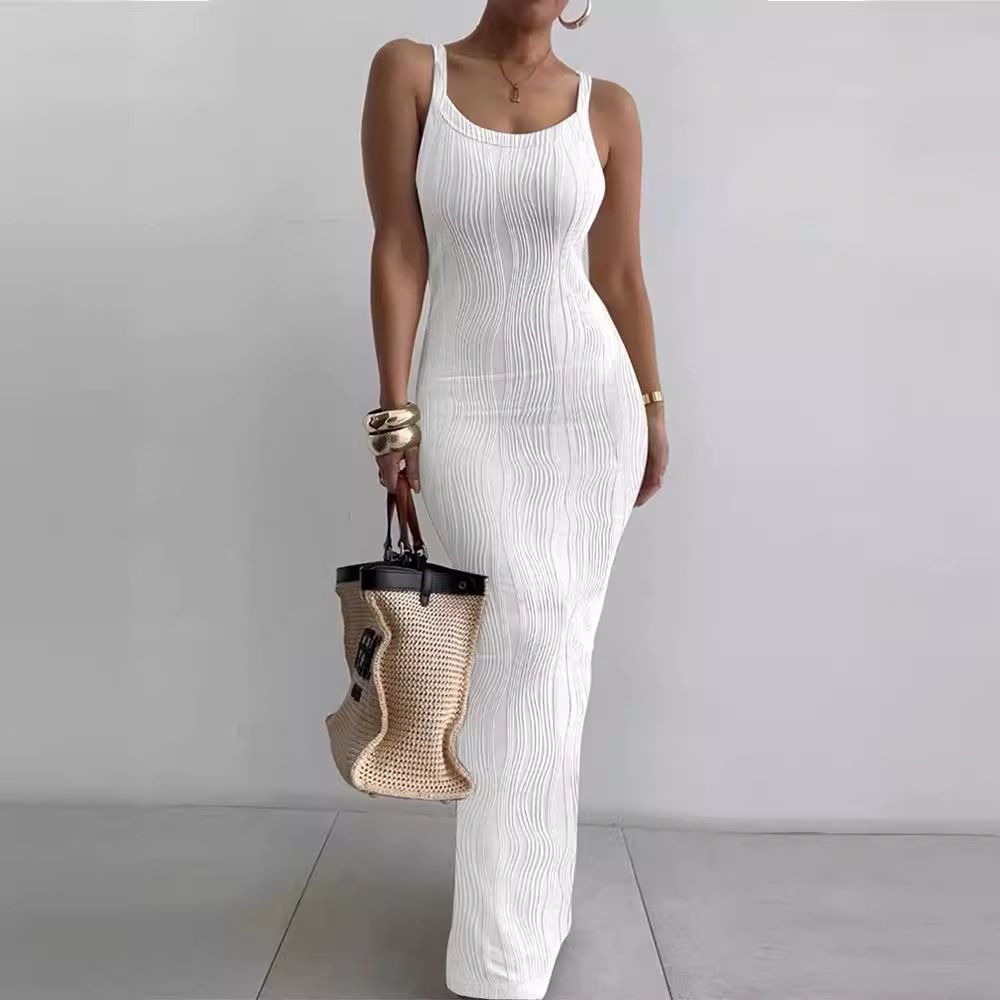 Elegant temperament of new women's dresses in summer, solid color sleeveless suspenders, slim and split long dresses are suitable for daily leisure commuting parties.