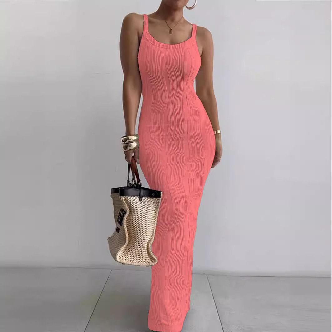 Elegant temperament of new women's dresses in summer, solid color sleeveless suspenders, slim and split long dresses are suitable for daily leisure commuting parties.
