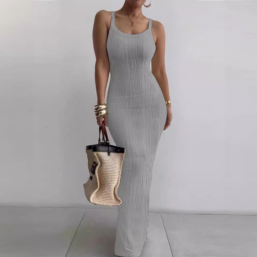 Elegant temperament of new women's dresses in summer, solid color sleeveless suspenders, slim and split long dresses are suitable for daily leisure commuting parties.