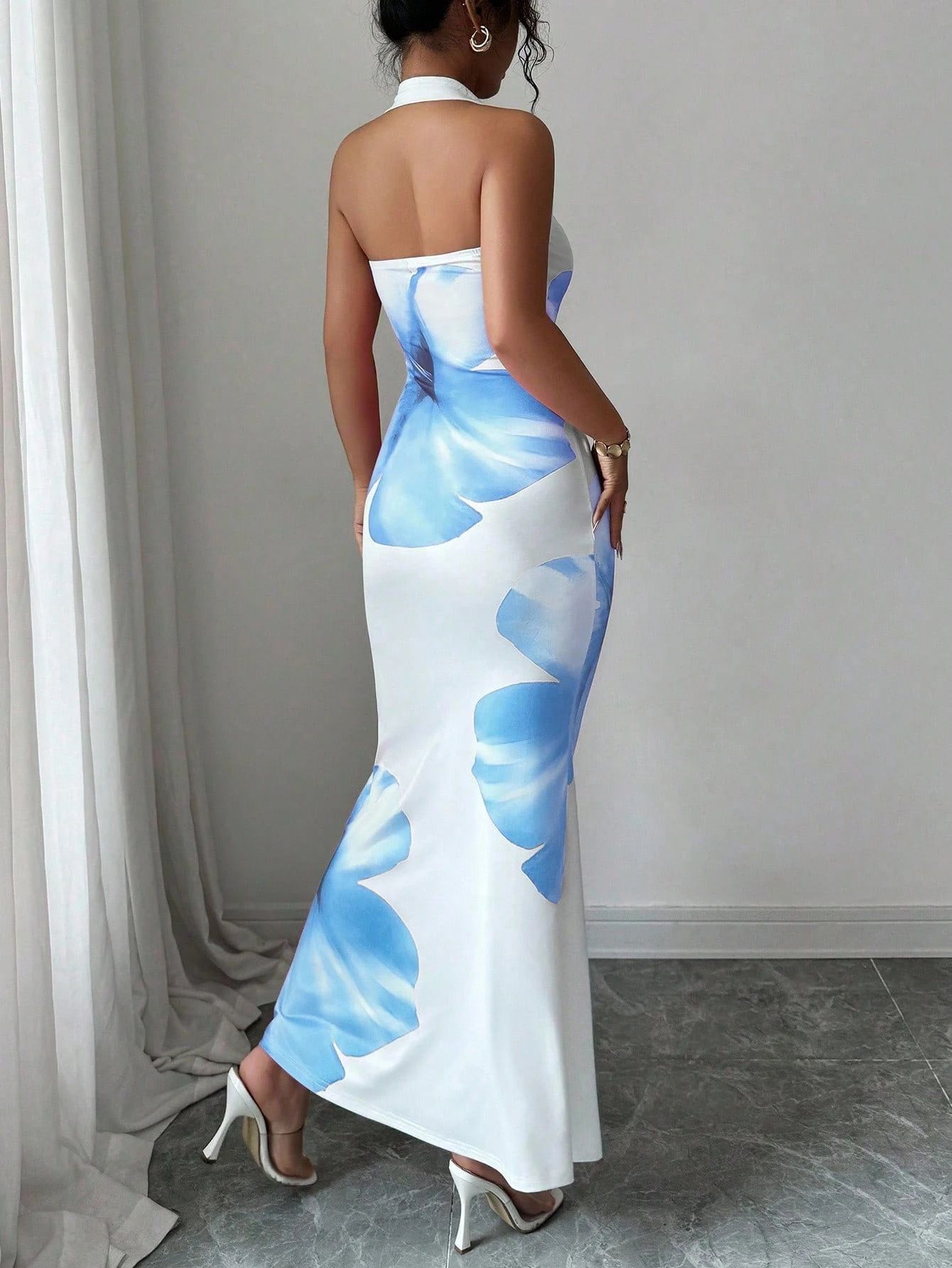 Elegant temperament print sleeveless hanging neck, tube top and waist pocket hip long dress in summer is suitable for daily leisure commuting party dinner.