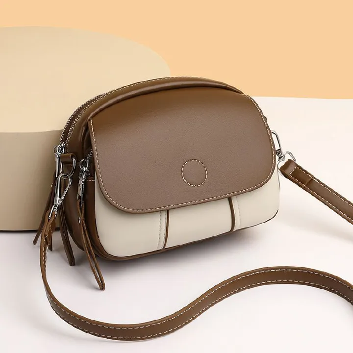 New women's bag fashion color matching zipper Joker shoulder bag mini messenger bag small round bag suitable for daily leisure commuting party.
