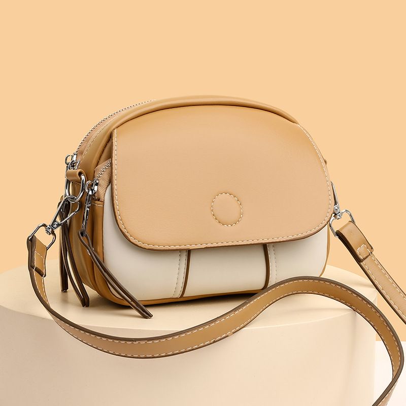 New women's bag fashion color matching zipper Joker shoulder bag mini messenger bag small round bag suitable for daily leisure commuting party.