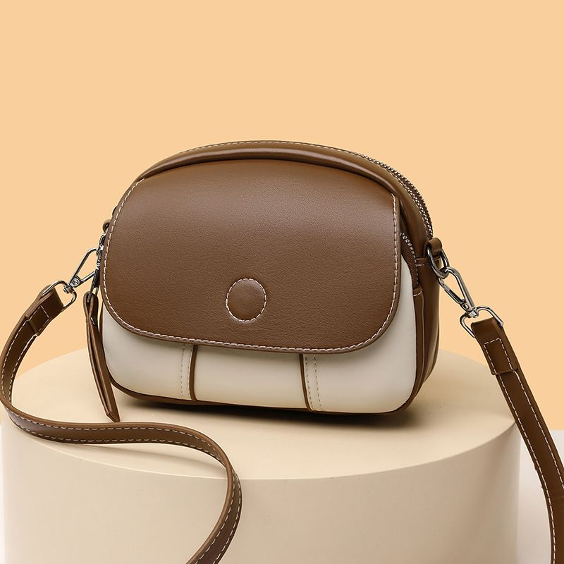 New women's bag fashion color matching zipper Joker shoulder bag mini messenger bag small round bag suitable for daily leisure commuting party.