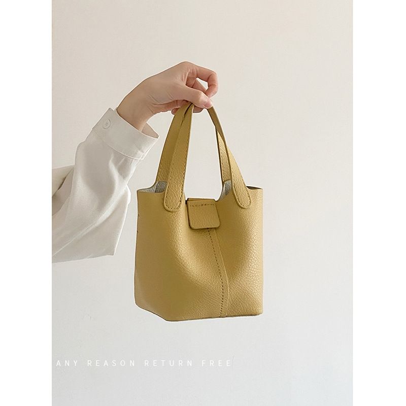 New handbag fashion solid color handbag Joker leisure bucket steamed stuffed bun mother bag is suitable for daily leisure commuting party.