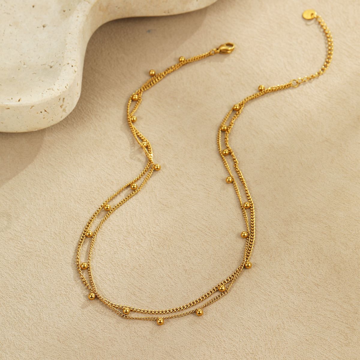 Cross border hot selling multi-layer gold round bead stainless steel necklace in Europe and America, retro fashion layered gold necklace wholesale for women
