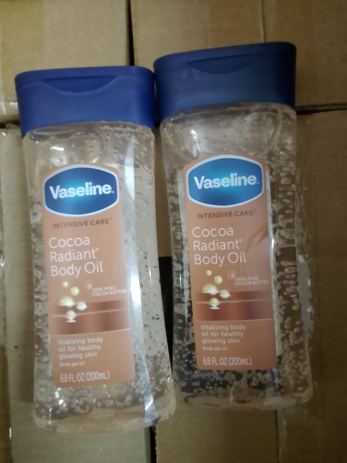 Vaseline intensive care Cocoa Radiant body oil 100% pore cocoa butter vitalizing body oil for healthy glowing skin body gel oil 200ml