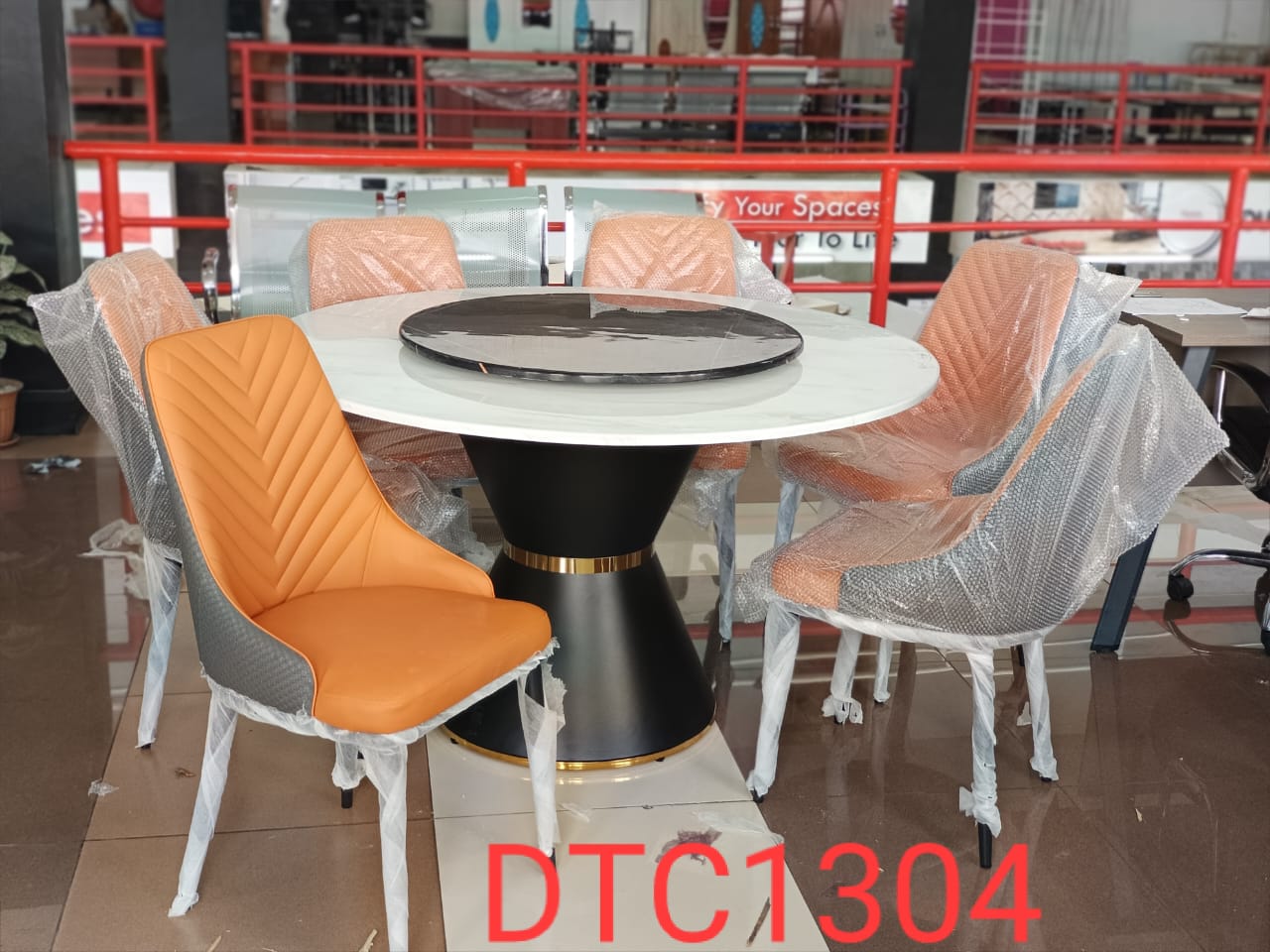 Executive Round marble Glass top six sitter dinning table with executive chairIdeal for homes, restaurants, or executive lounges, this dining set offers ample space for six people to dine comfortably.