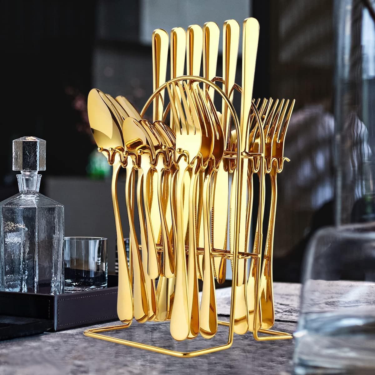 Gold cuttlery set This stainless steel 24 pieces cutlery set ensuring that you never run out of cutlery to have your favorite dish. With the set comes a stand that has been designed with a silver fini