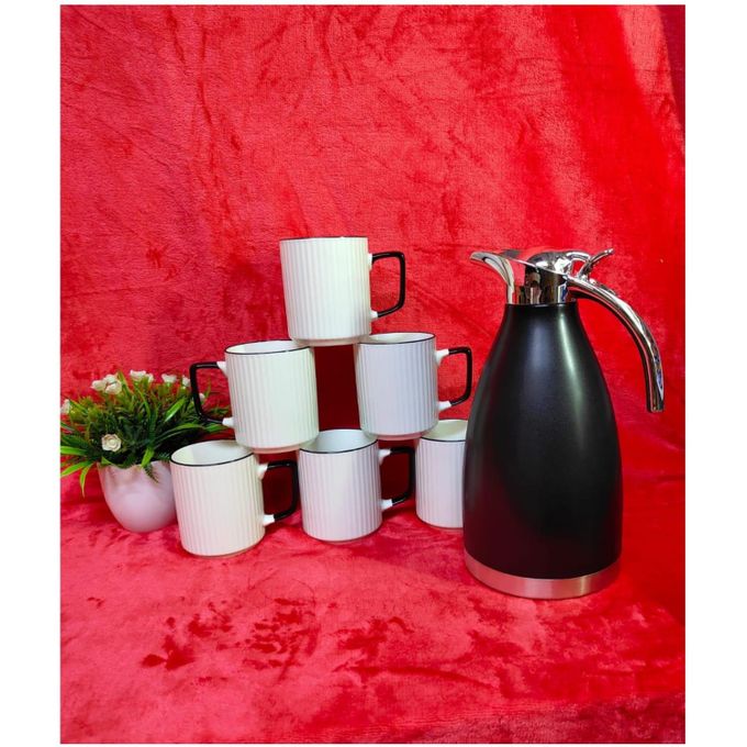 Japanese Premium White 6-Piece Ceramic Mug Set With Thermo Flask – Elegant Black Handle  Upgrade your tea or coffee moments with this premium 6-piece ceramic mug set paired with a sleek black thermos