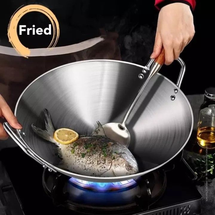 Thickened heavy gauge aluMade from stainless steel, cast in one piece with 2mm thick sides. Extremely durable and with high thermal efficiency.minum two  sided-handle wok frying pan