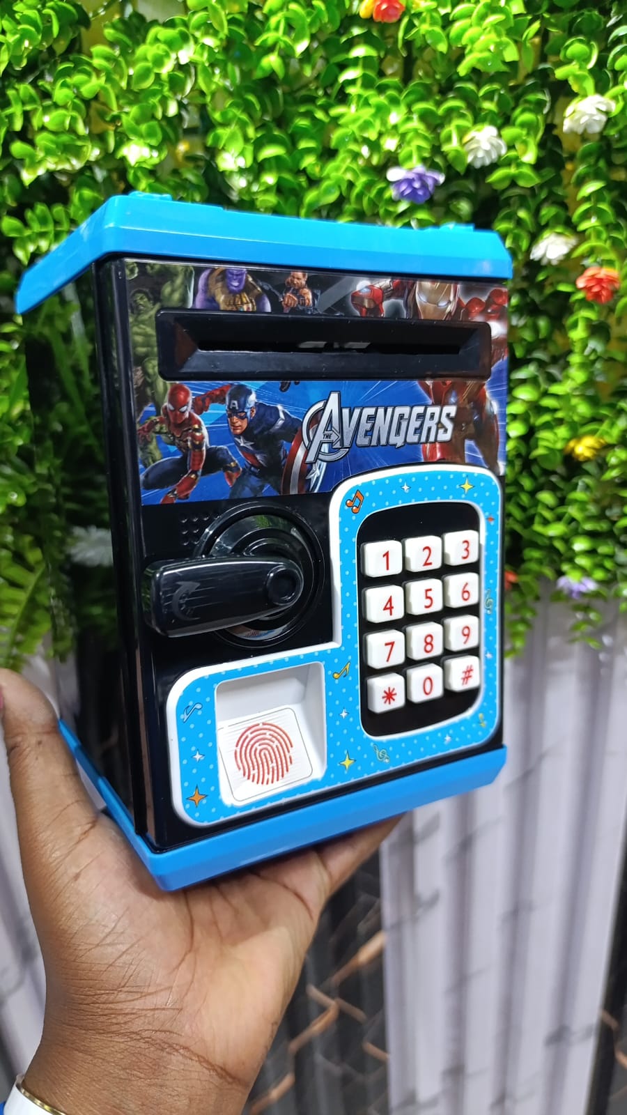 Battery operated kids home saving box...Has password lock and finger print