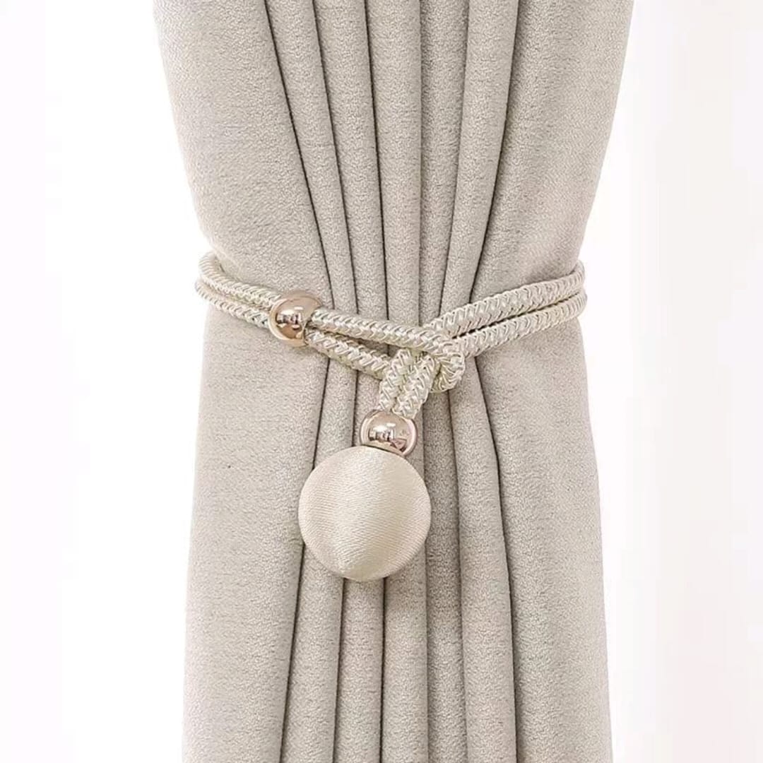 These elegant curtain tiebacks are a simple and stylish way to hold curtains neatly in place while adding a decorative touch to your space.