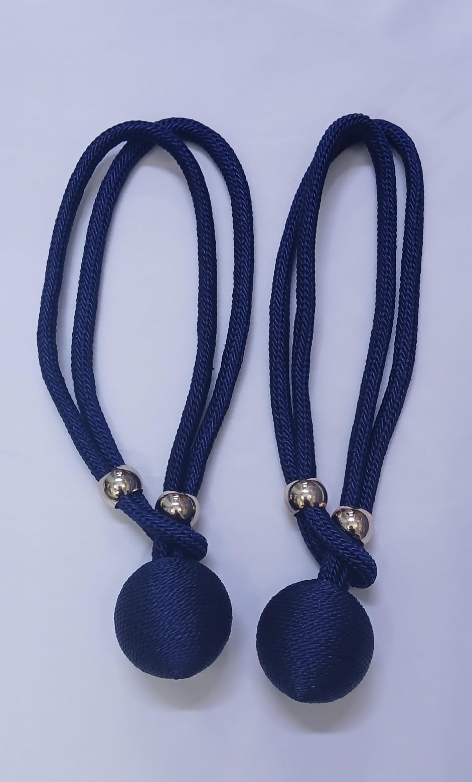 These elegant curtain tiebacks are a simple and stylish way to hold curtains neatly in place while adding a decorative touch to your space.