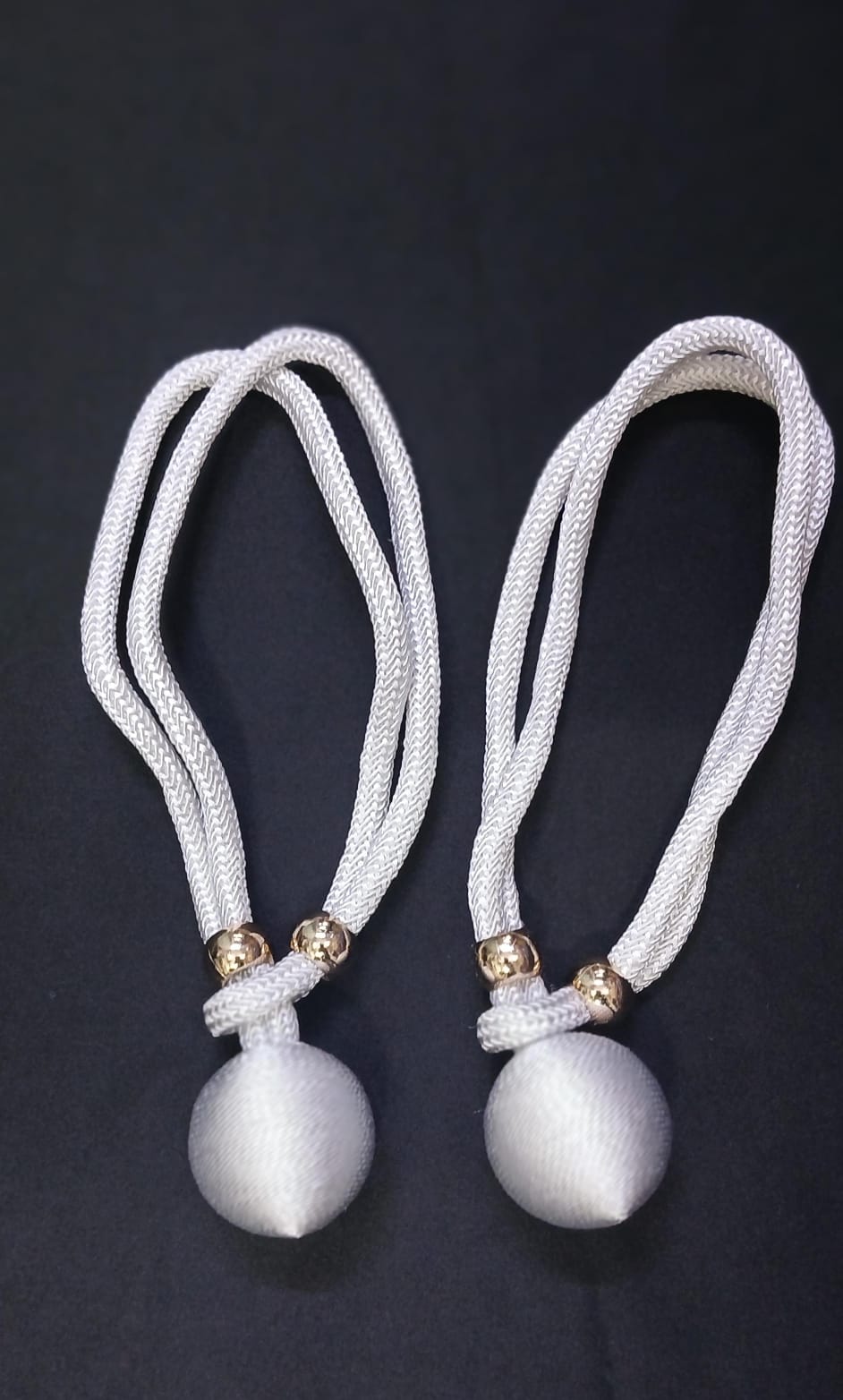 These elegant curtain tiebacks are a simple and stylish way to hold curtains neatly in place while adding a decorative touch to your space.