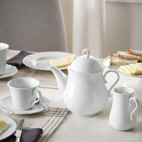 High quality Elegant Ceramic kitchen coffee/tea white pot...Dish washer and microwave friend with the capacity of 850mls