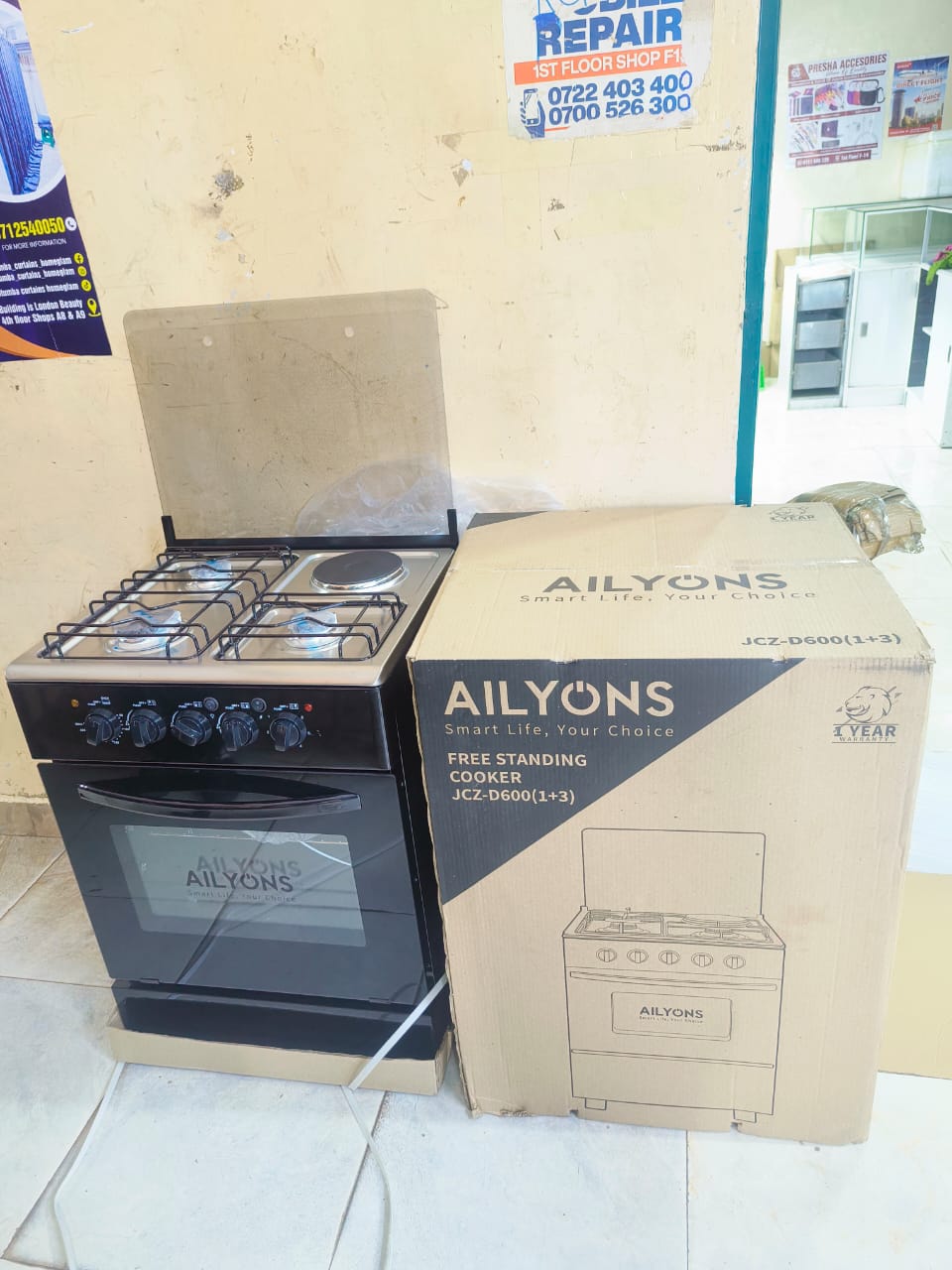 AILYONS 60*60 3+1 Standing cooker  -3gas plus 1 hotplate, Automatic ignition, Electric Oven (60L), Glass Top lid, Wide cooking base 60by60 .