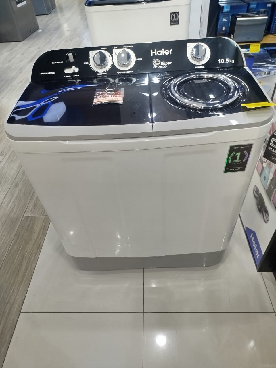 HAIER 10.5 KG TWIN TUB SEMI AUTOMATIC WASHING MACHINE - Wash capacity kg 10.5, Spin capacity kg 6.0, Air Dry, Transparent Lid, Control Knob, Rat Guard Baseplate Protection .