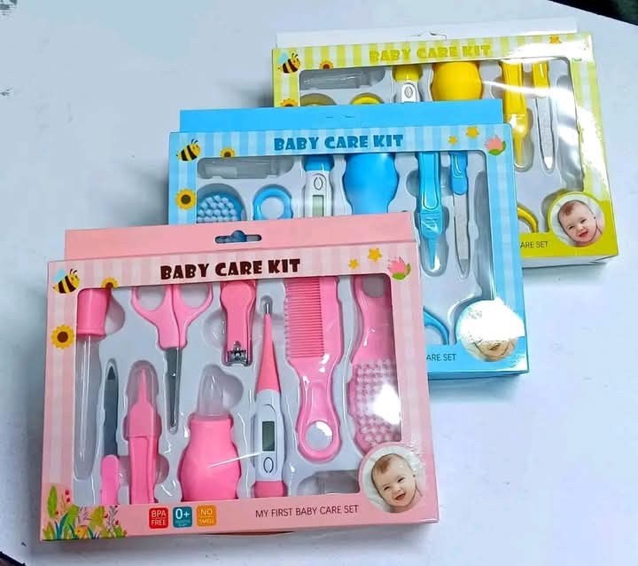 10 PCS BABY GROOMING CARE KIT - Soft-bristled hair brush, comb with non-scratching rounded teeth, curved nail clippers, scissors with rounded tips, scissors, cutter, and a hygienic transparent bag.