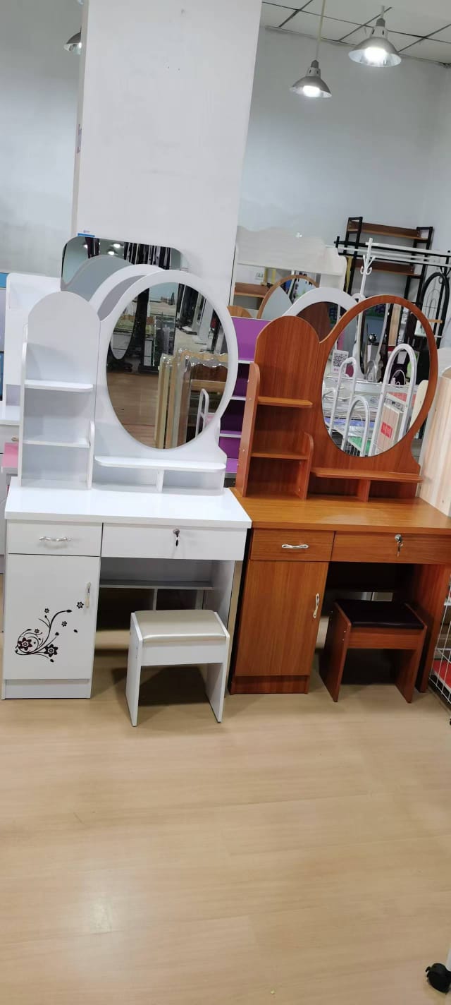 EXECUTIVE DRESSING TABLE WITH SLIDING MIRROR - 4 spacious drawers, allowing you to store your makeup stuff, jewelery.  Provides you the open and hidden storage spaces to fulfill almost all your need.