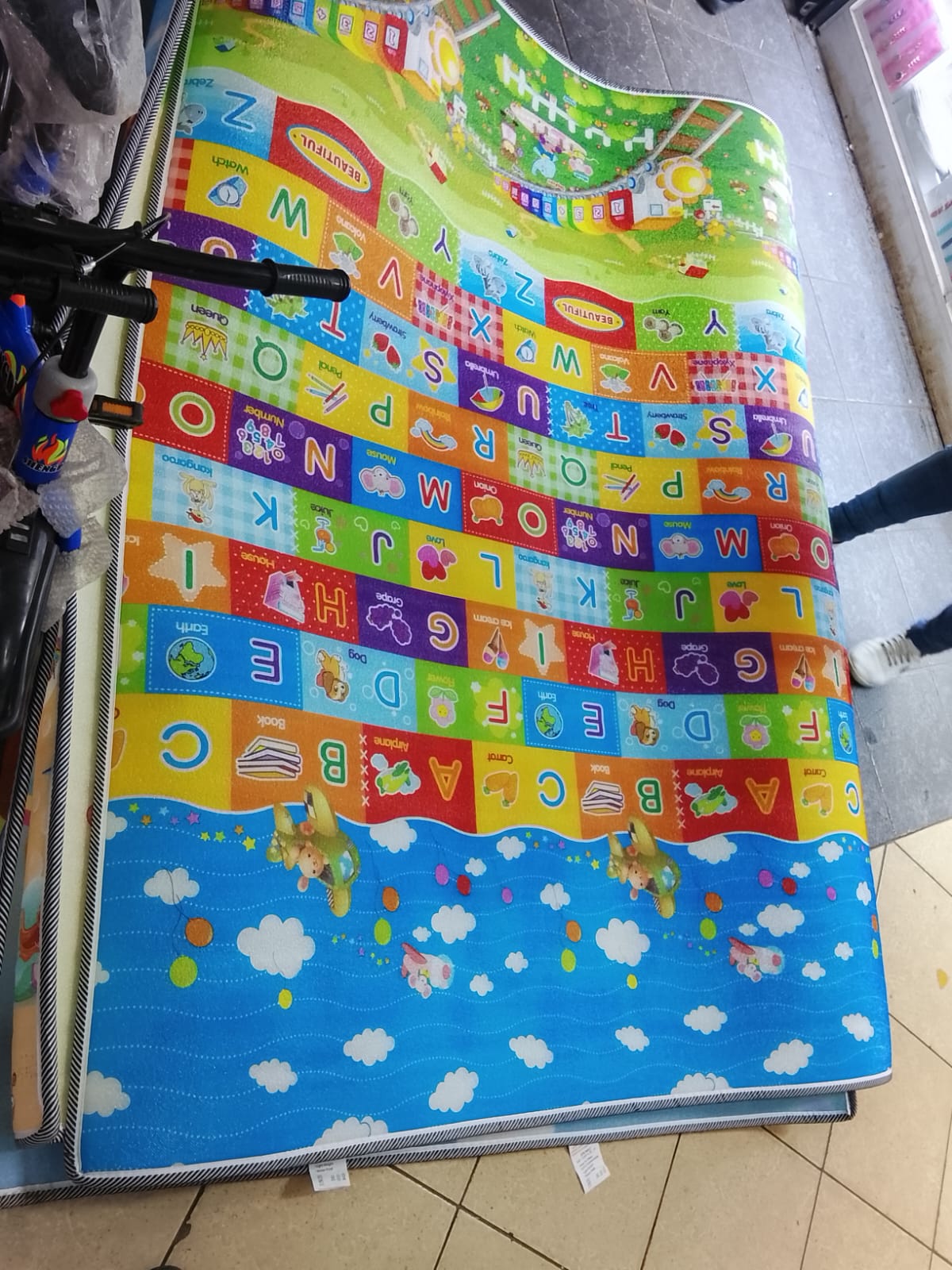 Baby playmat Give your little one a safe, comfortable, and fun play area with this double-sided printed crawling mat. Designed for babies, toddlers, and kids, it features colorful cartoon patterns tha