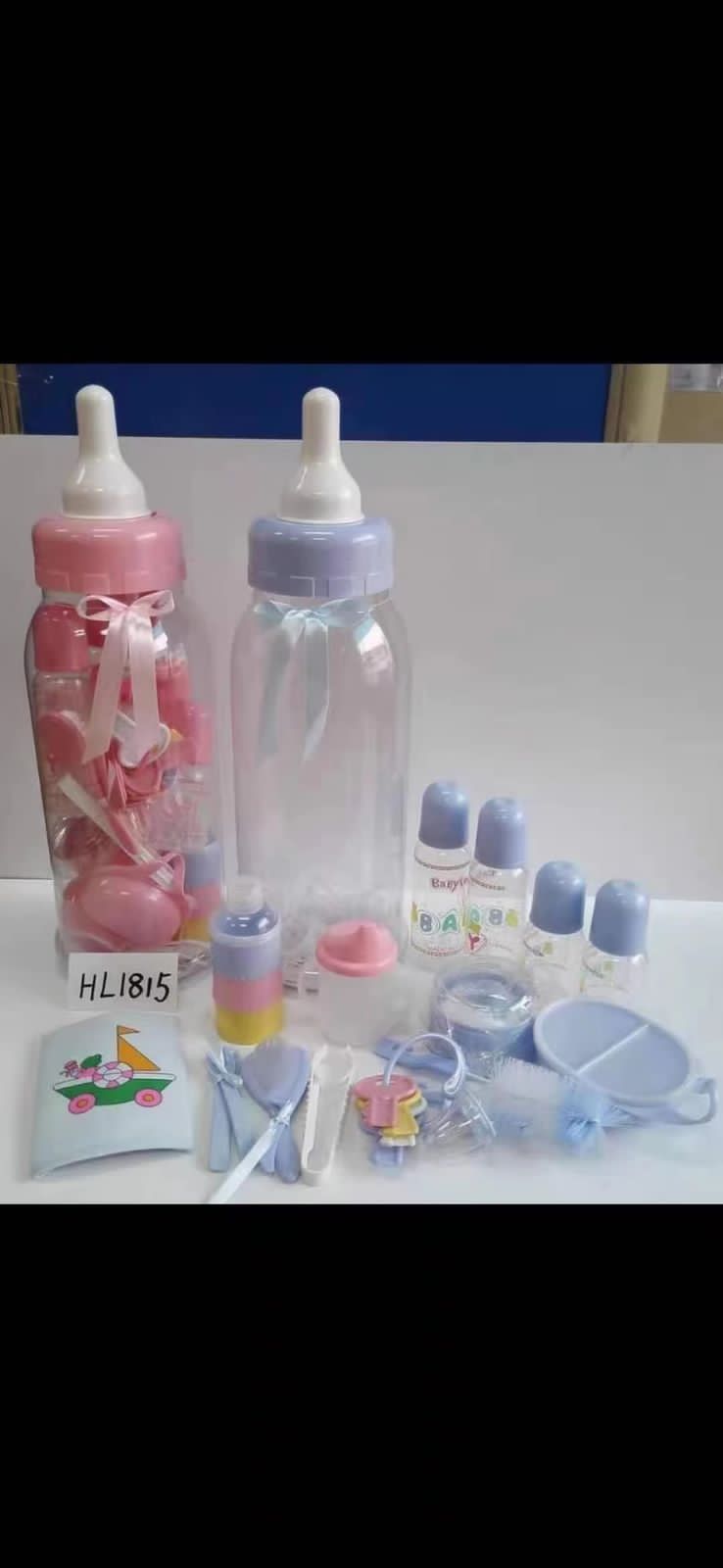 Baby feeding set Designed for convenience and safety, it includes feeding bottles of different sizes, a mini feeder, spoon and fork, suction bowl with lid, training cup with cotton buds, and a storage