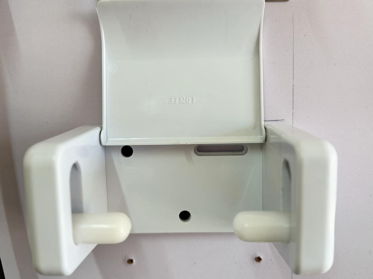 Toilet tissue paper holder