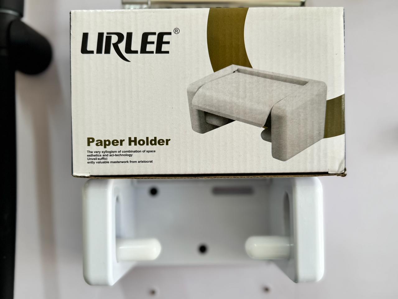 Toilet tissue paper holder