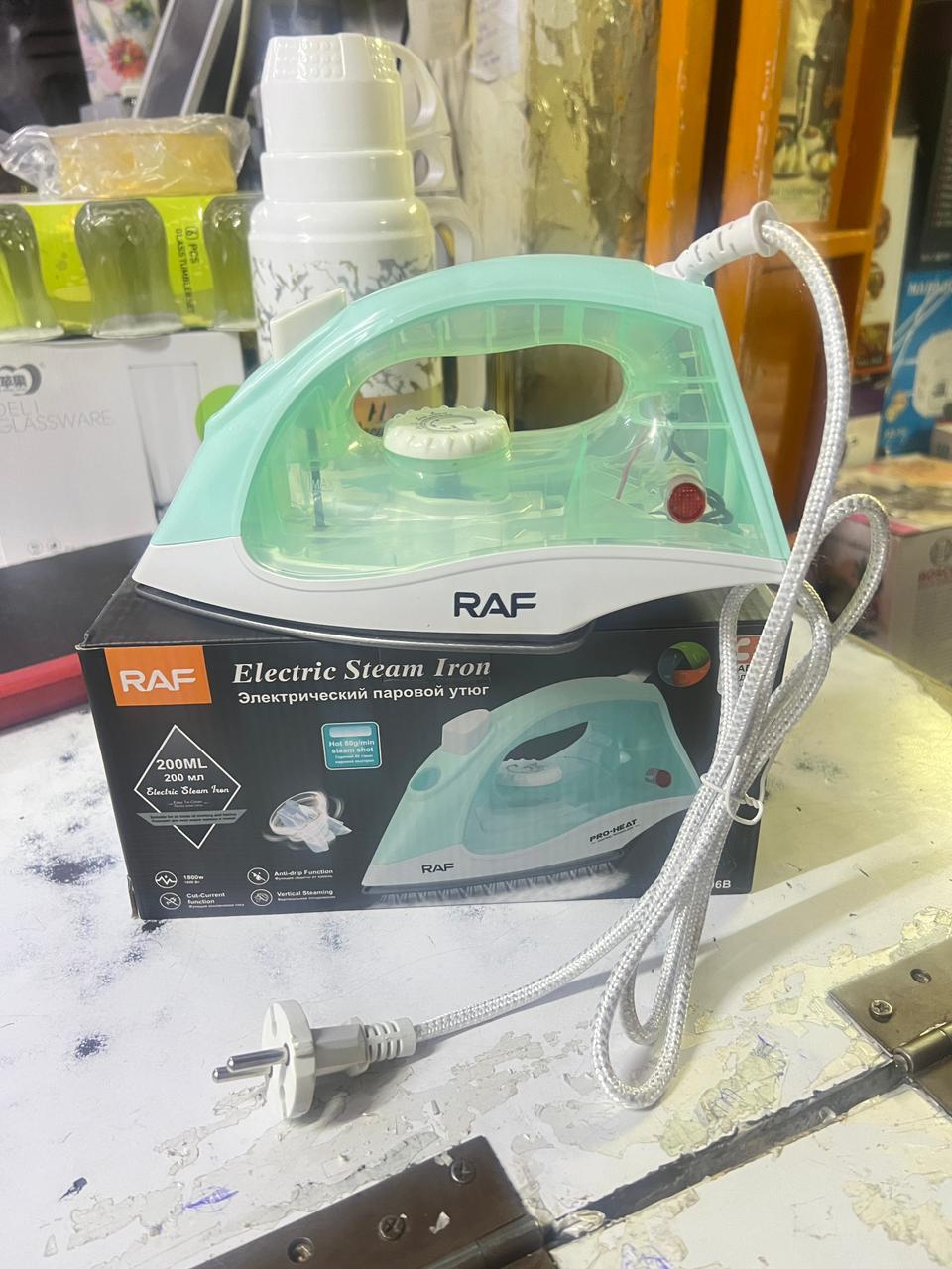 Steam iron box RAFHigh Quality Steam Iron Box With Teflon Non-Stick Bottom Plate.High efficient ironing keep your clothes tidy and smooth without wrinkle, make it look like a new one.