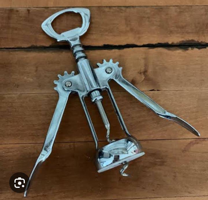 Corkscrew (wine opener) Durable metal construction for long-lasting use
Sharp spiral screw for easy cork penetration
Ergonomic handle for comfortable grip and smooth operation
Compact and lightweig