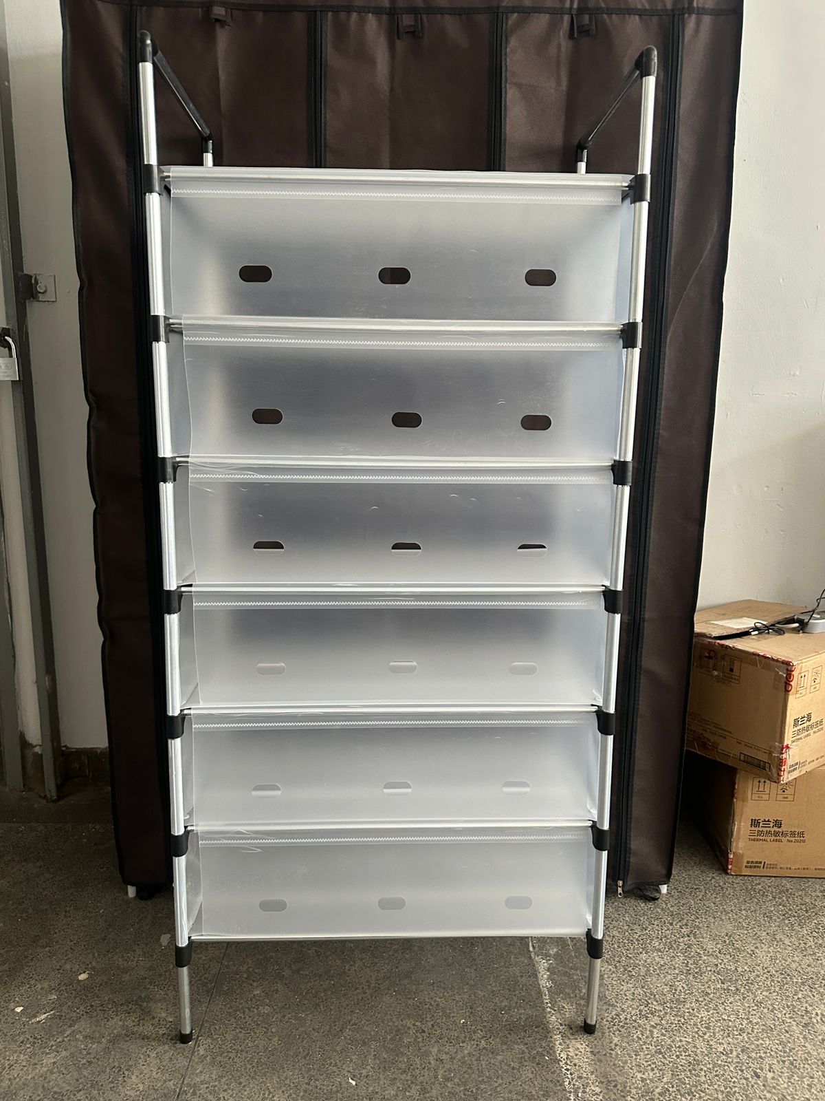 Dustproof Shoe Rack Organizer – 7-layer Storage Cabinet with Cover  this shoe rack seamlessly fits into any modern home decor. The minimalist design ensures it can be used in a variety of spaces such