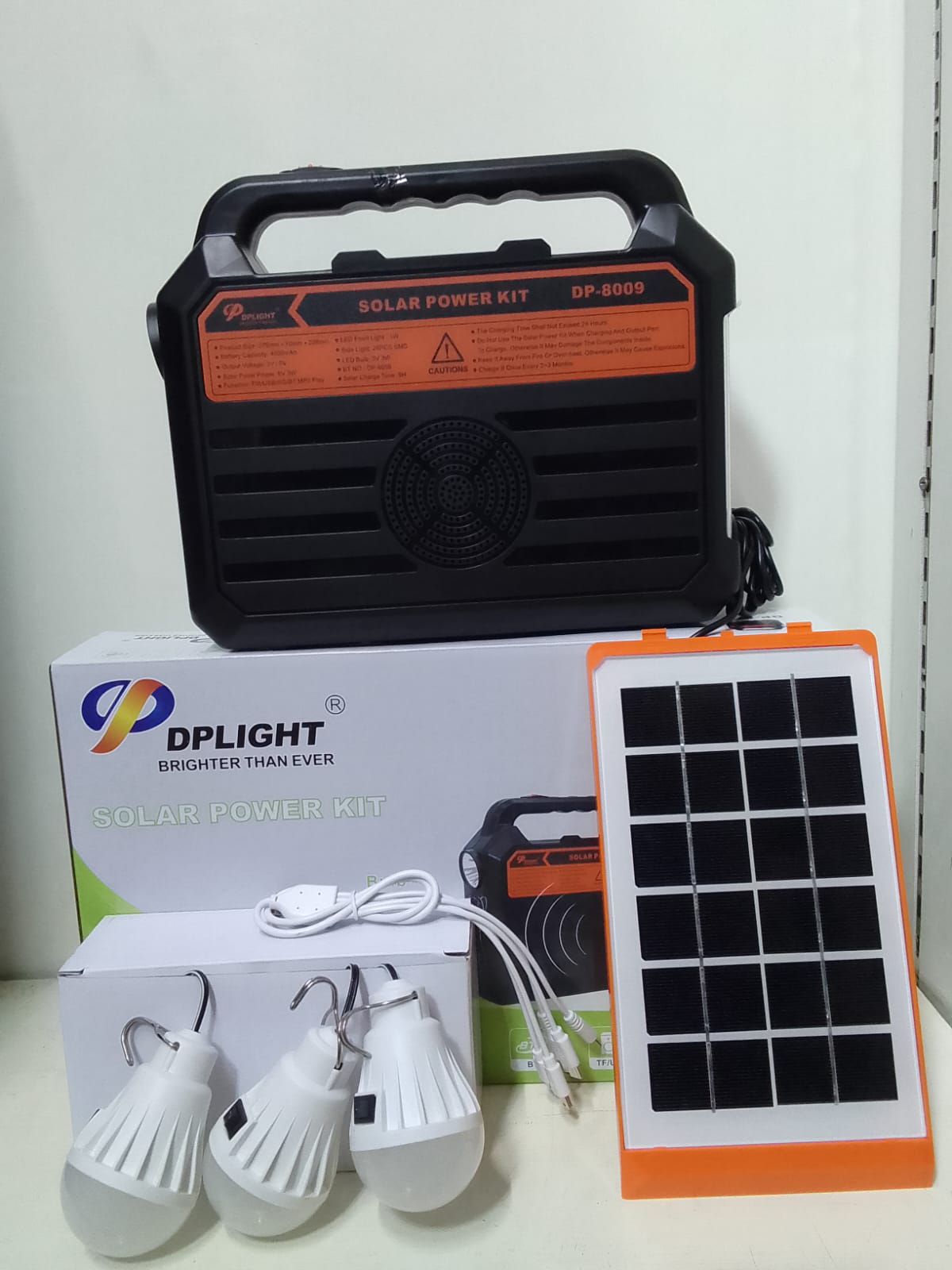 DP Solar Lighting System Kit With 3 LED Lights, Solar Panel, Power Cable And Multiple Phone Charger three bulbs-USB port-TF Card-music -Sport light-Bluetooth -TWS Link and fm radio