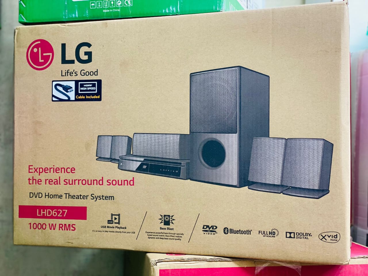 LG HOME THEATER LHD 627.  system’s brilliant Bass Blast produces powerful bass via a specially tuned sound matrix. The system features compatibility features such as bleutooth, USB, TFcard
