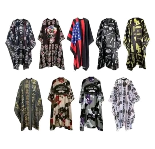hairdresser aprons or barber capes. 
These garments are worn by hair stylists and barbers to protect their clothing and the client's clothing from hair, dye, water, and other salon products during ser