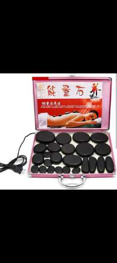 a hot stone massage set, typically used for hot stone therapy. 
Components:
Basalt Stones: The set includes smooth, polished basalt stones of various sizes, known for their ability to retain heat. 
He