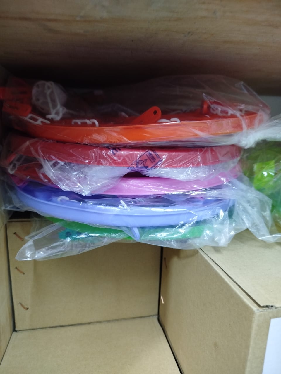 circular clothes drying rack with clips, often used for hanging and air-drying small items of clothing like socks, underwear, or baby clothes. 
Explanation: 
Design: It features a circular frame with