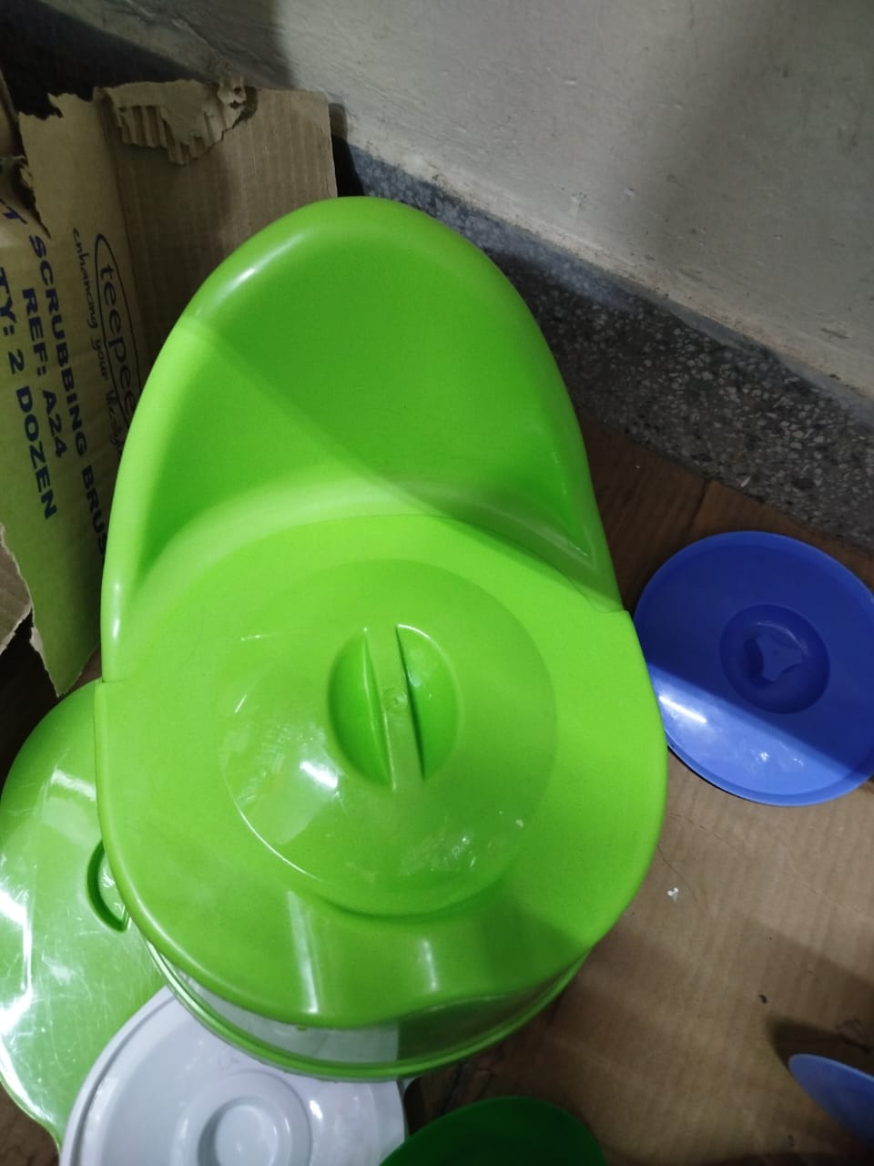 baby potty or potty training seat. 
This item is a small, child-sized toilet designed to assist in potty training, helping toddlers transition from diapers to using a standard toilet. It is typically