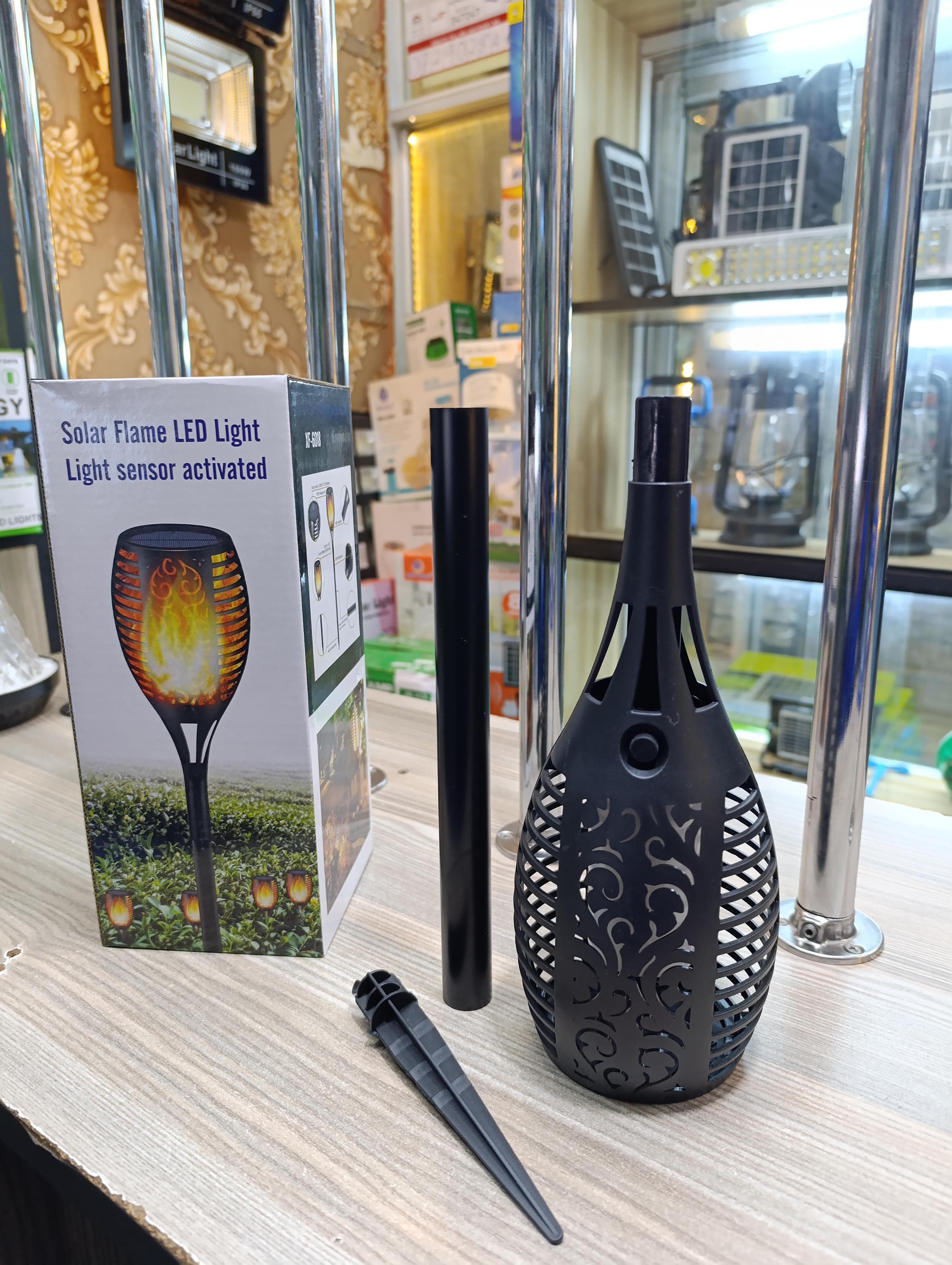 *Solar Flame Garden Lights*Enhance your outdoor space with our Solar Flame LED Light. This sensor-activated lamp provides a warm, flickering flame effect, adding ambiance to gardens, pathways.