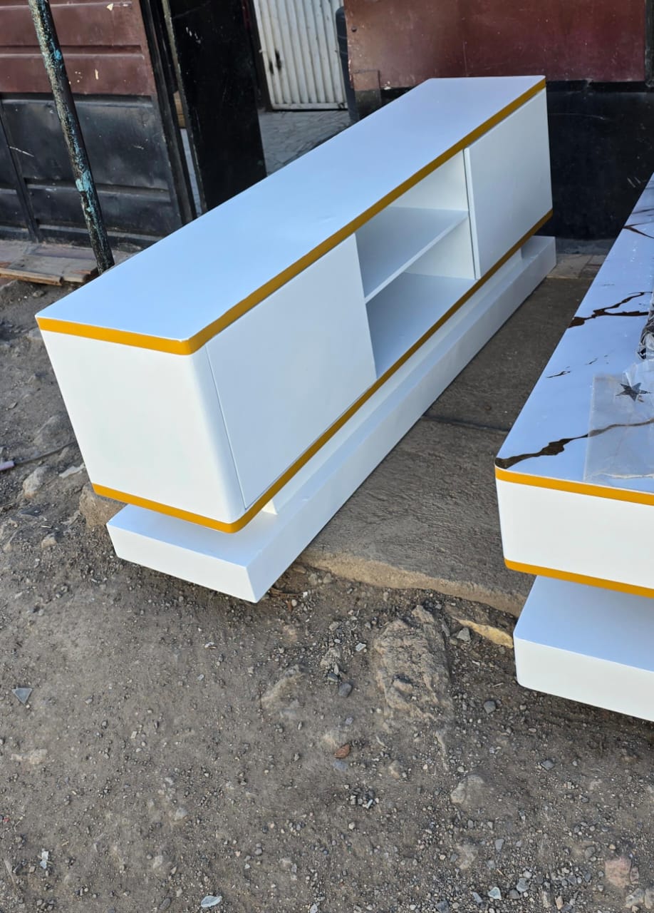 Gold themed 5fts tv stand.Bring sophistication and style into your home with our luxurious Gold-Themed 5ft TV Stand, designed to make your entertainment area the centerpiece of attention.