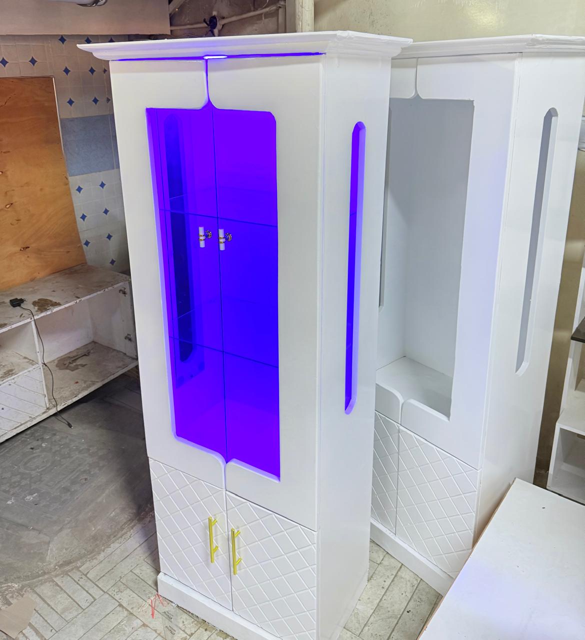 Modern White Display Cabinet | TV Unit Side Cabinet
Elevate your living space with this stunning modern white display cabinet — a perfect fusion of minimalist design and everyday functionality. Its cr
