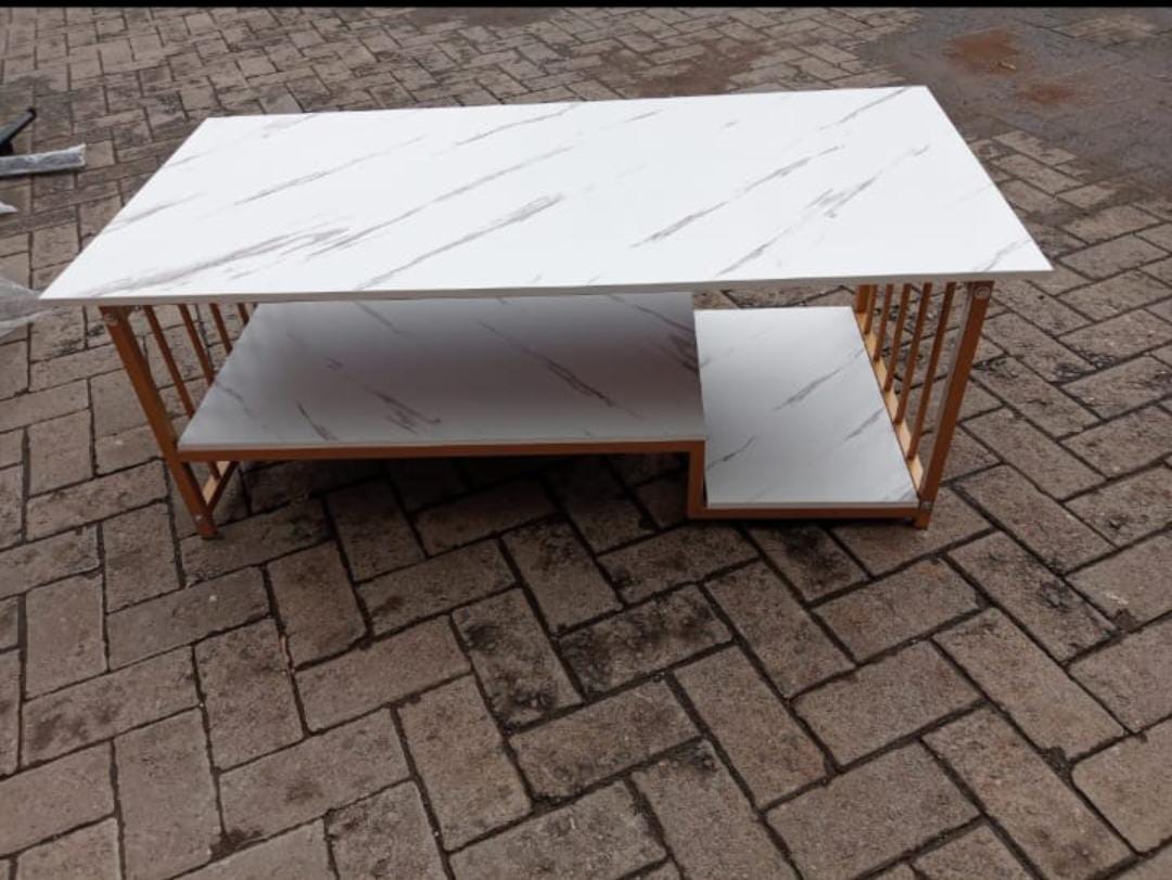 White marble coffee table Coffee table material: Laminated particle board, high-gloss surface treatment, easy to clean, just wipe it with a damp cloth  Elegant design: unique rectangular de