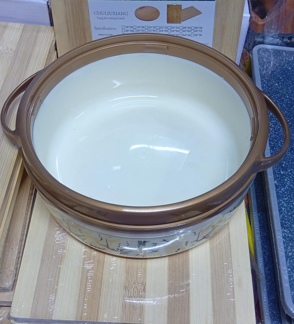 🍲 Beautiful Ceramic Cooking Pot –.🔑 Key Features:
✅ High-quality ceramic finish  
✅ Heat-resistant and easy to clean  
✅ Ideal for both cooking and serving  
✅ Stylish handles for safe carrying