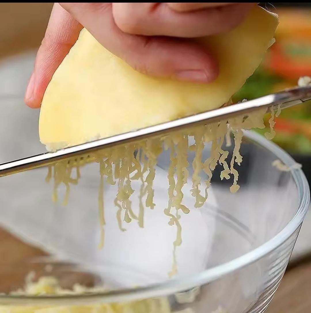 Stainless steel kitchen cheese grater with handle