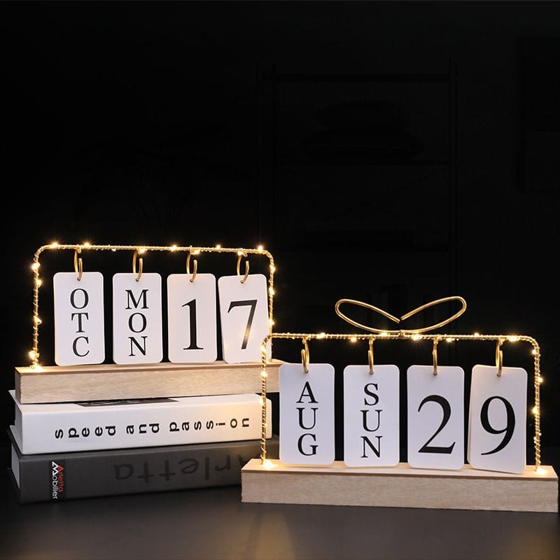 Metallic desktop home/office calendar with light...Uses 2 AA batteries  to light[not included]