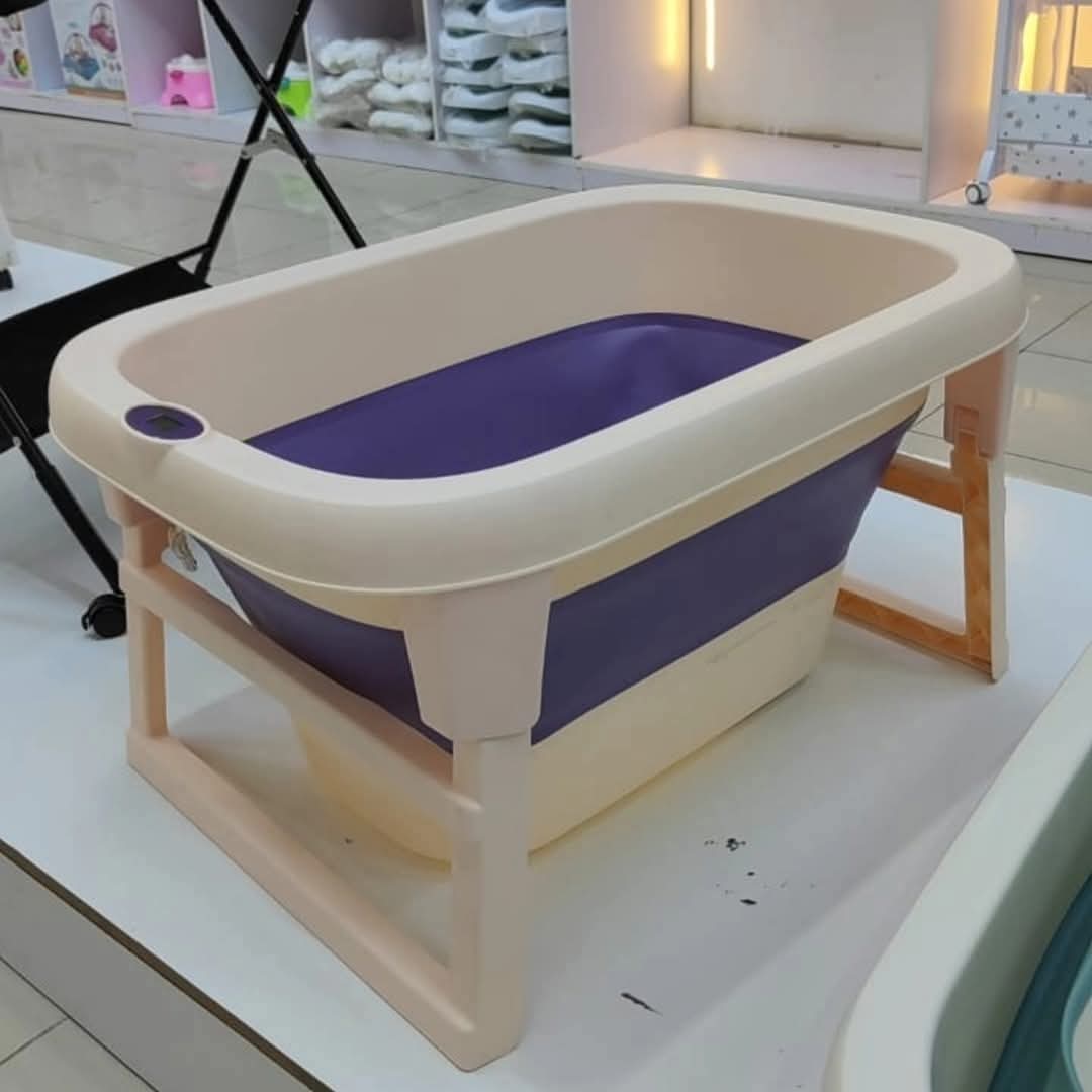Portable foldable baby bathtub,....it is Anti skid,has thermometer, and drainage