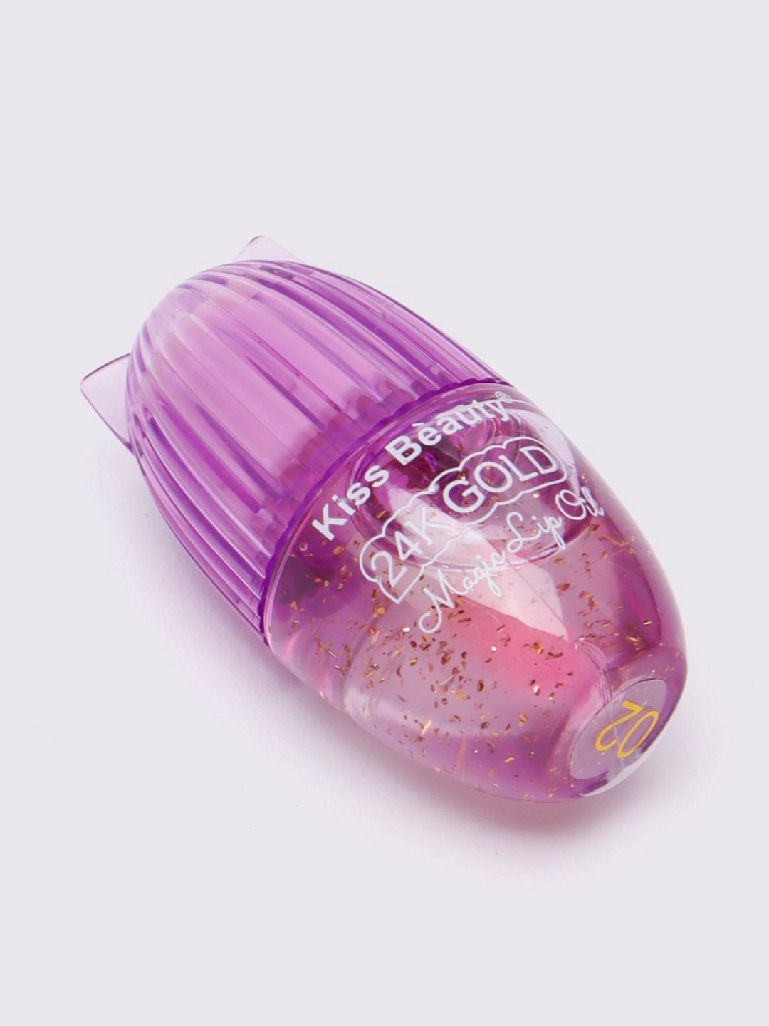 Lip Oil Gold Magic Lip Oil waterproof deeply moisturizes and softens your lips.