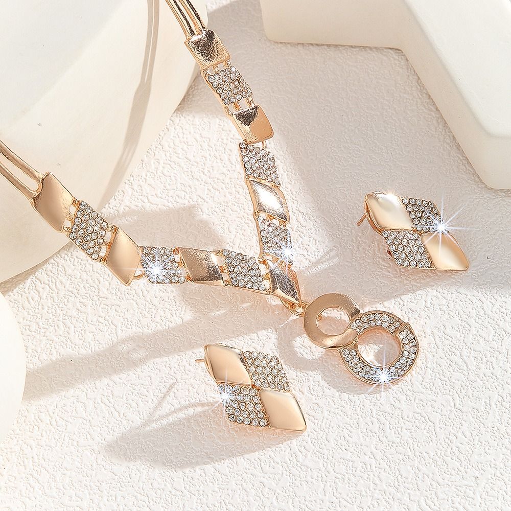 Hot Gold Zinc Alloy Inlaid 2025 Africa Europe America White Rhinestone Metal 8-figure Necklace Earrings Rhinestone Metal Ieopard Head Necklace Earrings Water Drop Necklace Earrings Set Women's Jewelry