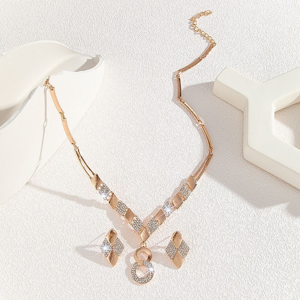 Hot Gold Zinc Alloy Inlaid 2025 Africa Europe America White Rhinestone Metal 8-figure Necklace Earrings Rhinestone Metal Ieopard Head Necklace Earrings Water Drop Necklace Earrings Set Women's Jewelry